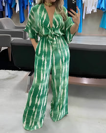 Macacão Feminino “Santino” com Laço – Elegante e Versátil